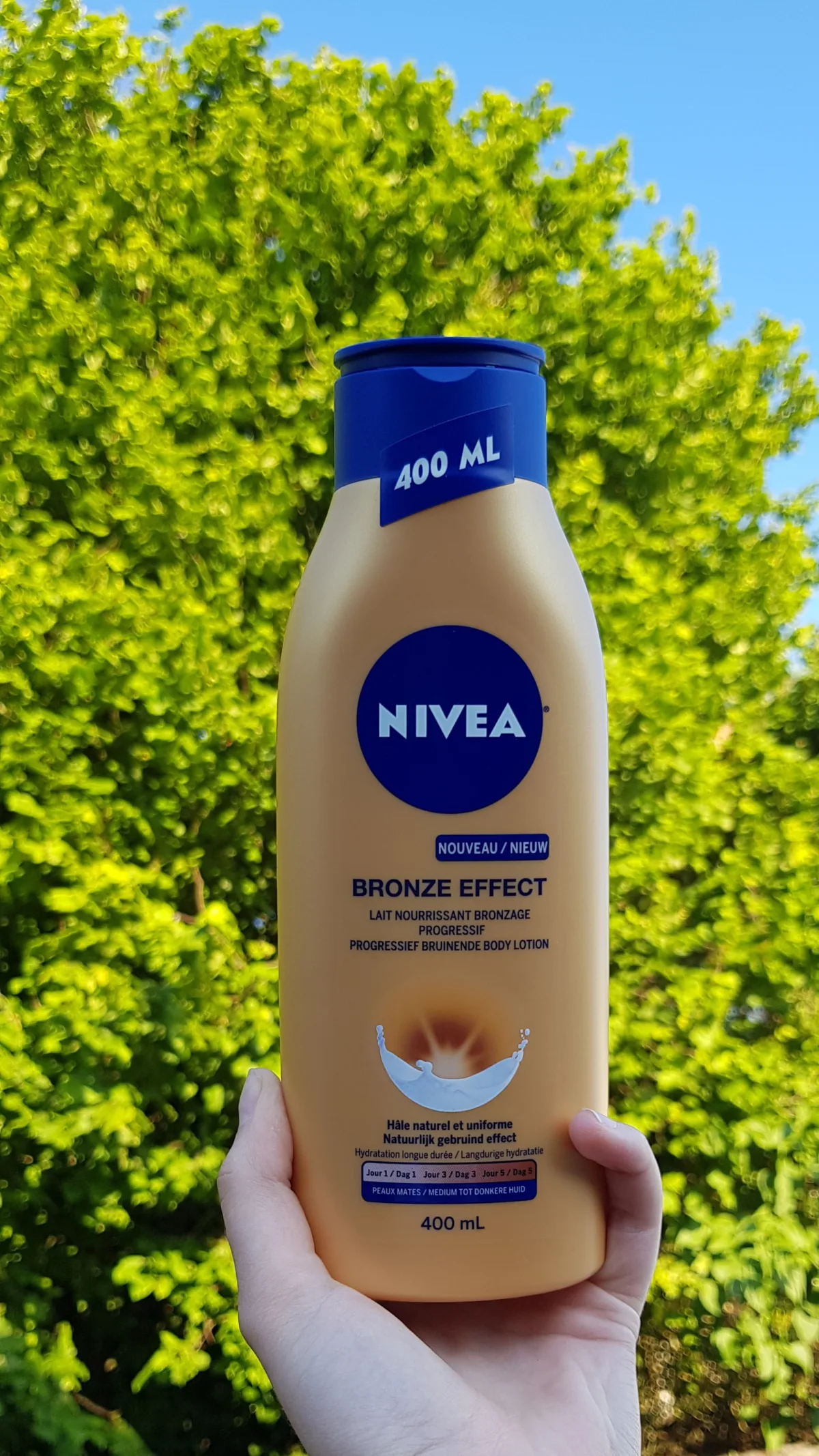 NIVEA Bronze Effect Bodylotion - Egaal Gebruinde teint - Hydrateert en bruint - Met ginkgo biloba en druivenpitolie - 400 ml - review image