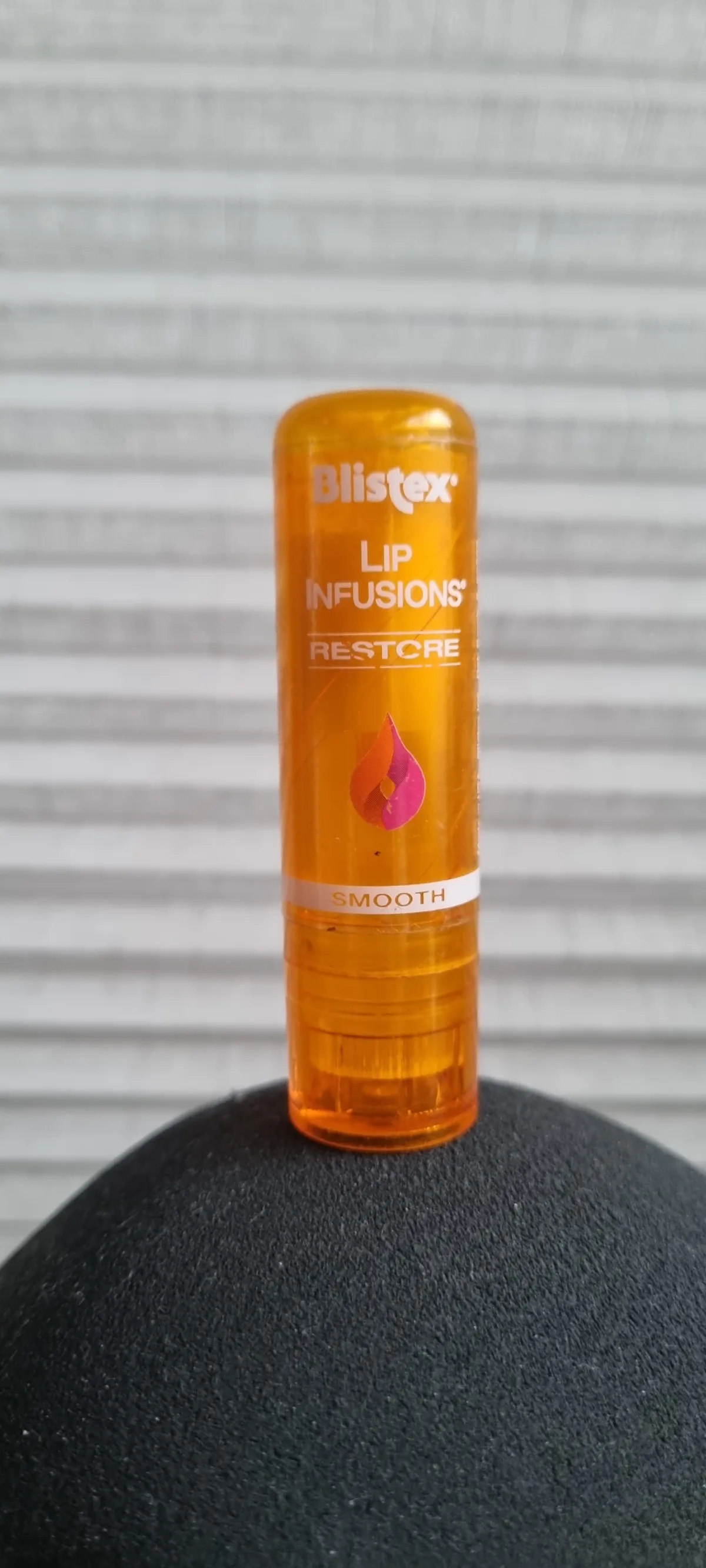 Blistex lippenbalsem - lip infusion balm restore - balsem stick - mwet kokosolie en natuurlijke bijenwas - oranje - review image