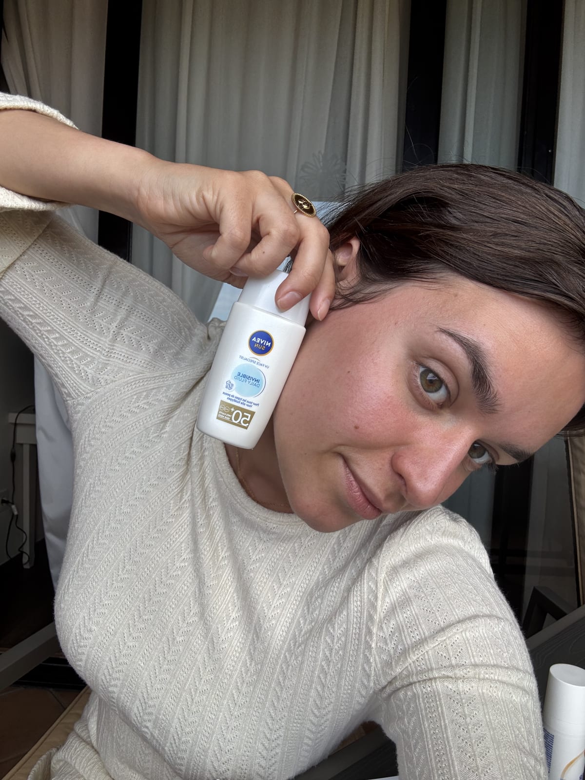NIVEA SUN UV FACE SPECIALIST Invisible Daily Fluid SPF 50+ - review image